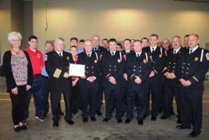 Chamber Director Suzanne Williams presented a Chamber “Milestone Award” Sunday to the Smithville Volunteer Fire Department for 80 years of service to the community