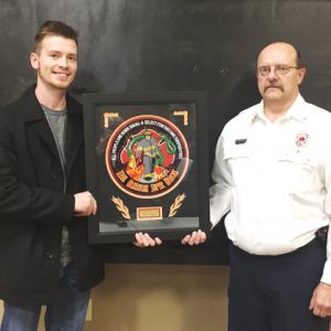 The 2017 Wilson Bank & Trust DeKalb County Volunteer Firefighter of the Year is Matt Adcock, Station Commander of the Belk Station (left). Award presented by Captain Michael Lawrence