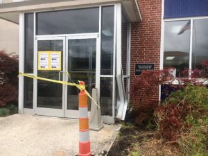 Car Hits Entrance to Post Office Building