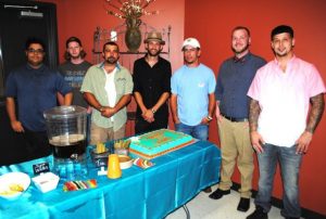 Posing with their graduation cake are (left to right) Brian Murphy, Jacob Waggoner, Billy Moss, Matthew Wenger, Spencer Wallace, Jonathon Hummel, and Justin Redmore (BILL CONGER PHOTO FOR WJLE)