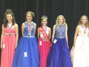 Jamboree Pageant: Ages 11-13. 4th runner-up Katlynn Ellis, 3rd Jenna Elizabeth Wright, Queen Keara McKinsey Milligan, 1st Hannah Paige Trapp, and 2nd runner-up Amanda Clair Autry