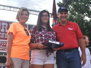 State Representative Terri Lynn Weaver and State Senator Mark Pody presented US Flag to Yiwhaa Redmon of Thailand