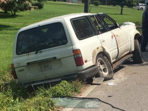 The driver of a Toyota Land Crusier lost control and wrecked. One of the occupants was bleeding from his head but refused to be transported by EMS to the hospital.