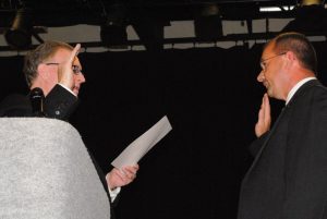 The newly elected county public officials are to take their oath of office at swearing-in ceremony on Monday, August 29 at 5:30 p.m. in the auditorium of the Mike Foster Multi-Purpose Center. Picture shows Sheriff Patrick Ray taking Oath of Office from Judge Bratten Cook II in 2018.