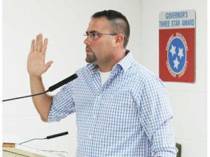 Josh Miller previously being sworn in as alderman