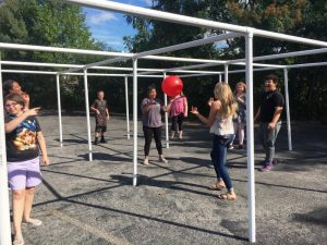 Kids enjoying 9 Square in the Air during After School event at the Smithville Church of God