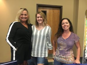 Rhonda Harpole, Katie Parker, and Norene Puckett of the DeKalb County Recovery Court at Health Fair Friday