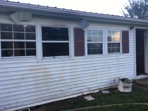 Home of Ashley Adcock on Belk Road. Picture shows exterior wall of bedroom where fire started inside the home