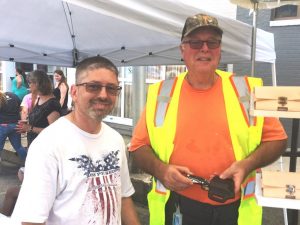 Alexandria Mayor Bennett Armstrong (right) with Jeffrey Dheere of OMG Leatherworks at Alexandria Old Timers Day last year