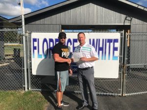 The DCHS Football Program received a check from Florence & White Ford of Smithville Friday in the amount of $3,960. The check was presented to DCHS Football Coach Steve Trapp by Jimmy White (right) of Florence & White Ford