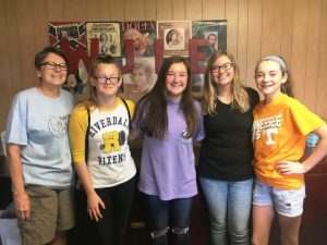 Girl Scout Troop Co-Leader Joanie Williams with girl scouts Leah Hayes, Katherine Gassaway, Zoe Cripps, and Katie Patterson