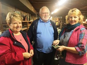 Susan DeMay greets Luanna and Phil Tollett during the annual Off the Beaten Path Studio Tour Friday at her studio in Smithville. The Tour continues through Sunday, October 28.