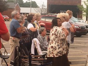 Attendees at Prayer on the Square Stand for Pledge of Allegiance