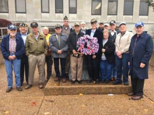Veterans place wreath at memorial monument following tribute program last year