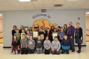 State Representative Terri Lynn Weaver presents the 5th grade classes at DeKalb West with a proclamation congratulating the school on being a Reward School