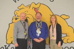 Bill Conger (center) named Teacher of the Month for January at DeKalb West School. Pictured with Principal Sabrina Farler and Assistant Principal Joey Agee