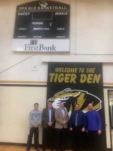 DCHS Tiger Coach John Sanders, Casey Midgett and Scott Garrett of FirstBank, DCHS Principal Randy Jennings, and DCHS Lady Tiger Coach Danny Fish