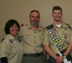 Assistant Scoutmaster Jen Sherwood and Troop 347 Scoutmaster Will Sherwood with Will Stephens