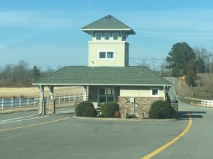 Rear side view of Welcome Center/Guard Shack at Riverwatch on Billings Road