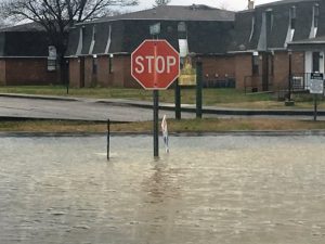 College Street underwater during flash flooding at Green Meadow Drive in February