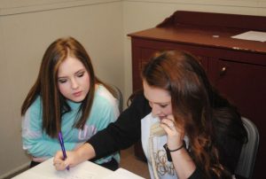 Picture shows high school students taking pledges during WJLE DCHS Project Graduation Radiothon from a few years ago