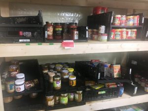 Distribution Day finds pantry shelves stocked with plenty of food from Second Harvest Food Bank