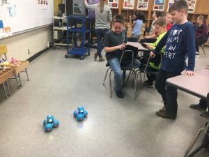 Students playing with Makerspace robots