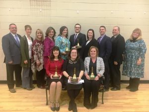 Teachers of the year with administrators and sponsor: Seated- Vicky Hawker of Smithville Elementary; DeKalb County Teacher of the Year Linda Parris at DCHS, Cheryl Vandagriff of Northside Elementary; Standing-DCHS Principal Randy Jennings; DeKalb West Principal Sabrina Farler, DeKalb Middle Principal Amanda Dakas, Acting Smithville Elementary Principal Anita Puckett, Jessica Antoniak of DeKalb West, Justin Nokes of DeKalb Middle School; Principal Karen Knowles of Northside Elementary, Director of Schools Patrick Cripps, Roy Nelson Pugh of Liberty State Bank, and Lori Isabell