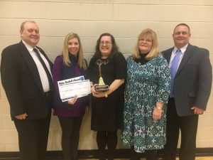 Roy N. Pugh of Liberty State Bank, Assistant DCHS Principal Jenny Norris, DeKalb County Teacher of the Year and DCHS Teacher of the year Linda Parris, Lori Isabell, and DCHS Principal Randy Jennings