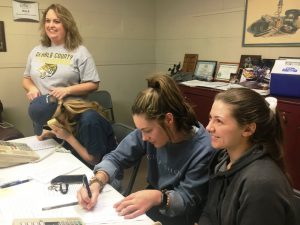 Trina Hedge and DCHS Class of 2019 members Macy Hedge, Lydia Brown, and Faith Judkins participating in 2019 WJLE Radiothon for DCHS Project Graduation