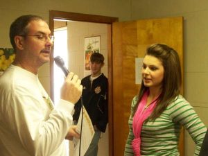 DCHS Teacher Chris Vance Interviews student during a previous Radiothon a few years ago