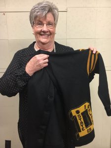 Katherine Wright Pack proudly shows off her 1965 State Tournament Letter Sweater