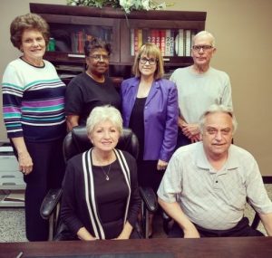 DeKalb Election Commission: Seated-Walteen Parker and Administrator of Elections Dennis Stanley. Standing-Barbara Vanatta, Jackie Smith, Lisa Peterson, and Jim Dean