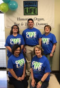 County Clerk’s Office to Celebrate National Blue & Green Day for Organ and Tissue Donor Awareness April 12: County Clerk James L. (Jimmy) Poss with staff: Standing Tammie Pack, Jimmy Poss, and Nancy Young. In front: Kyra Walker and Judy Miller McGee
