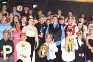 The DCHS Climate Crew Club and other participating sponsors hosted a first ever prom for special needs students at the school cafeteria. Other students escorted the participants and helped tend to their needs during the evening (Photo by Laura Stone)