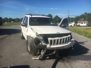 2000 Jeep driven by Chris Smithson. His 10 year old child was in the Jeep with him.