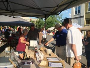 Vendors selling a variety of goodies during Saturday's Summer Kick-Off Block Party downtown