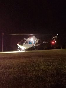 A woman was airlifted with serious injuries after a one auto crash late Sunday night on Big Rock Road that also involved a man and two children. (Jim Beshearse Photo)