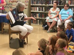 Lisa Cripps, Coordinator of the DeKalb Prevention Coalition, read two picture story books to the kids including one called “We are all Wonders”