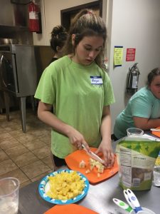 Megan Price preparing yogurt parfait