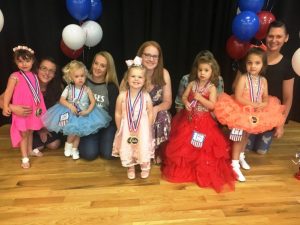 Miss Jamboree Pageant (Ages 25 to 48 months), the winner is Summer Elizabeth Longmire (center) Runners-up pictured L to R: 4th-Nevaeh Anderson, 2nd- Dallas Wray Agee, Queen Summer Elizabeth Longmire, 1st- Aleeya Weslyn Graham, and 3rd-Jazlin Elizah Cantrell