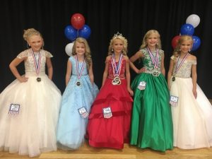 Miss Jamboree Pageant (Ages 7 to 10), the winner is Destiny Keys (center). Runners-up pictured left to right: 4th-Lilly Grace Anderson, 2nd- Harper Monroe Patrick, Queen Destiny Keys, 1st- Ella Grace Kirksey, and 3rd- Khloe Elizabeth Grandstaff