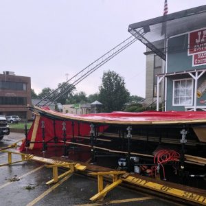 Structure damage to Fiddlers Jamboree stage from Thursday storm