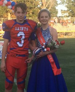 Saints Homecoming 7th grade attendant Macy Anderson with escort Austin Nicholson