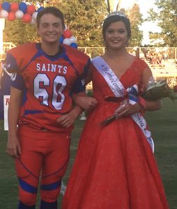 Saints Homecoming 8th grade attendant Elaina Bryce Turner with escort Konner Young