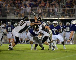 DCHS Tiger Brady Hale running for yardage in last week's Watertown game (Tena Edwards photo)