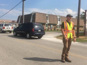 Smithville Police Chief Mark Collins directing traffic Friday at Smithville Elementary School on East Bryant Street