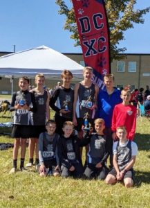 DMS Saints Cross Country team competed at their Mid-State Regional Qualifier meet at Macon County High School on Saturday, October 12th