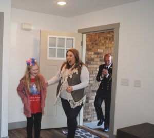 Caitlin and daughter Lilly Grace Anderson entered their new home at 155 Evergreen Lane Smithville for the first time Monday morning after a dedication ceremony by the Stephen Siller Tunnel to Towers Foundation which honors the legacy of those who made the ultimate sacrifice while serving our country by providing mortgage-free homes to surviving families with young children. Army PFC Billy Anderson lost his life in Afghanistan on May 17, 2010, leaving behind his young wife Caitlin and 8 month old daughter Lilly Grace who is now 10 years old.