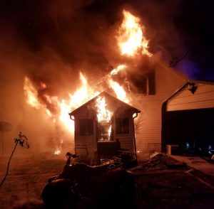 A home was heavily damaged in a structure fire Saturday night at 722 Fisher Avenue. Members of the Smithville Volunteer Fire Department, Smithville Police Department, and DeKalb EMS responded. There were no injuries. (Jim Beshearse photo)